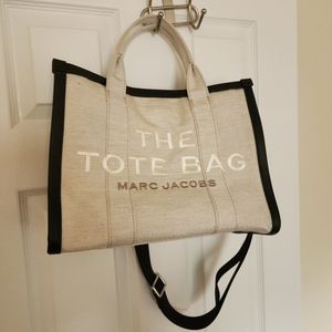 Medium size marc jacobs cream w/black leather.